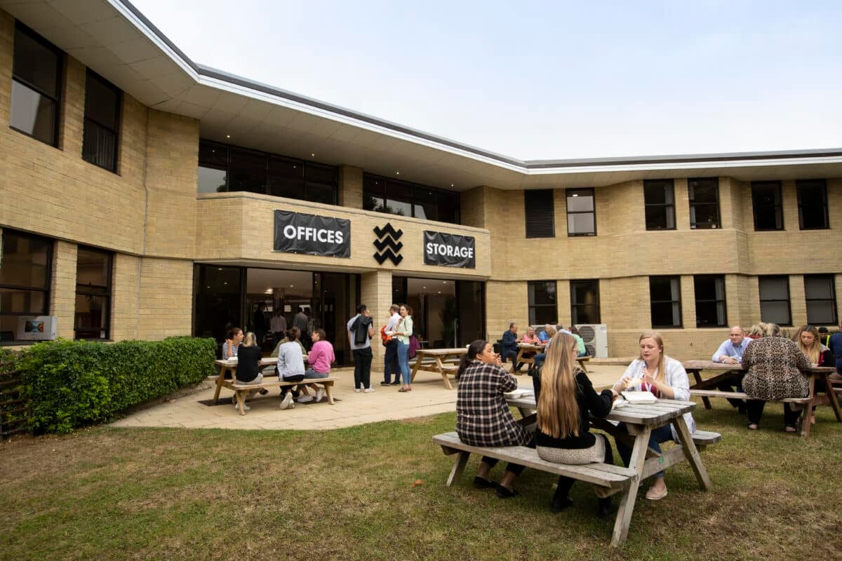 Members lunching together outside the offices