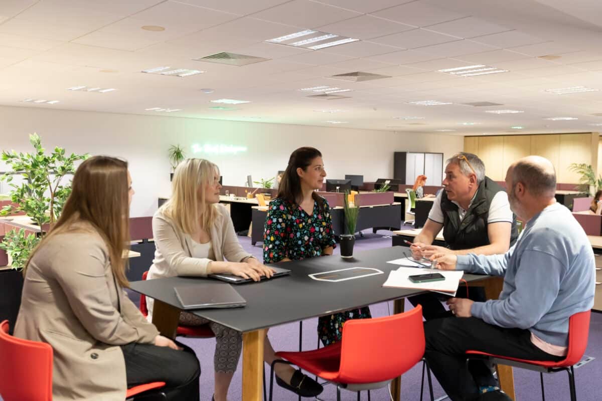 A team meeting in the co-working area