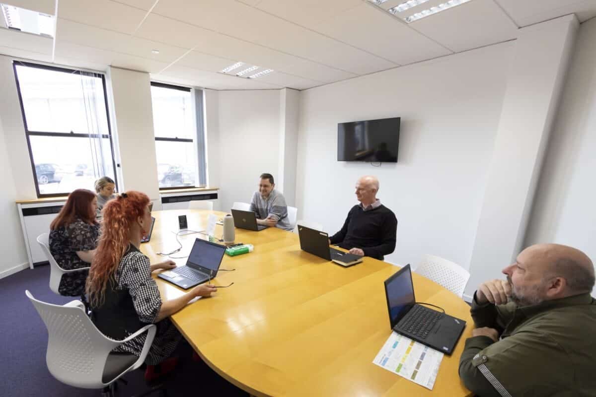 A meeting room set up for a session
