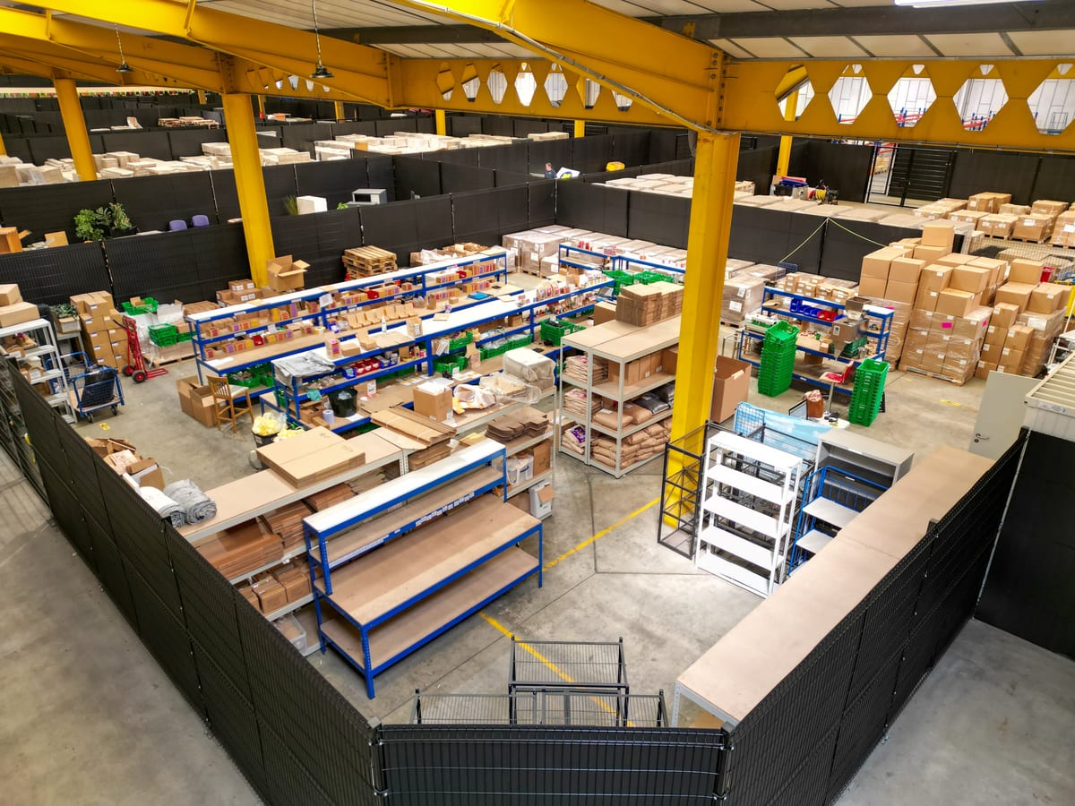 Shelving and stock inside a modular warehouse unit