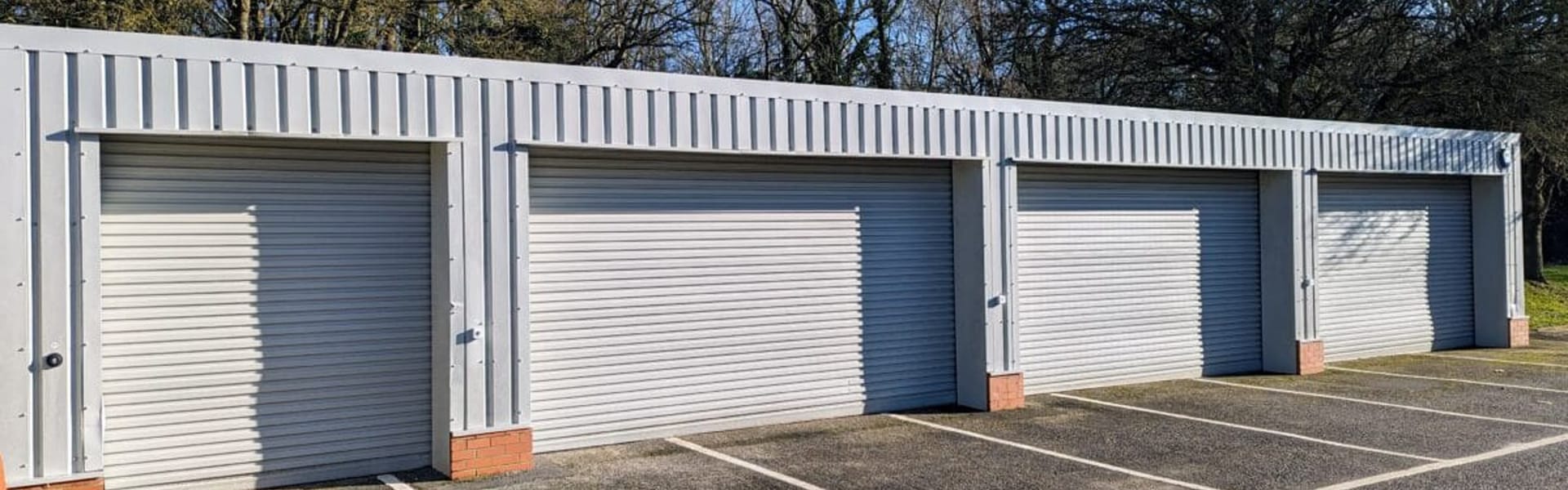 A row of secure lock-up garages at Watermoor Point
