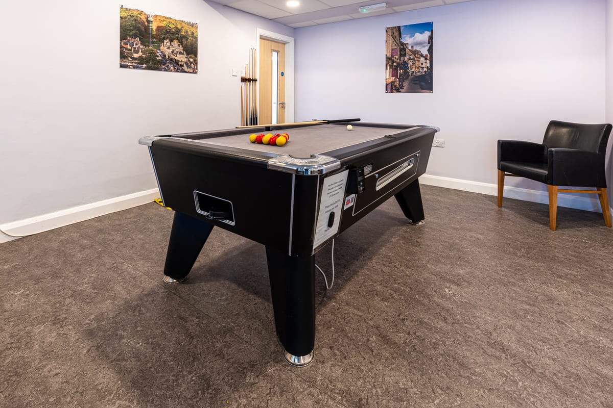 The games room at Riverside Hotel with a pool table
