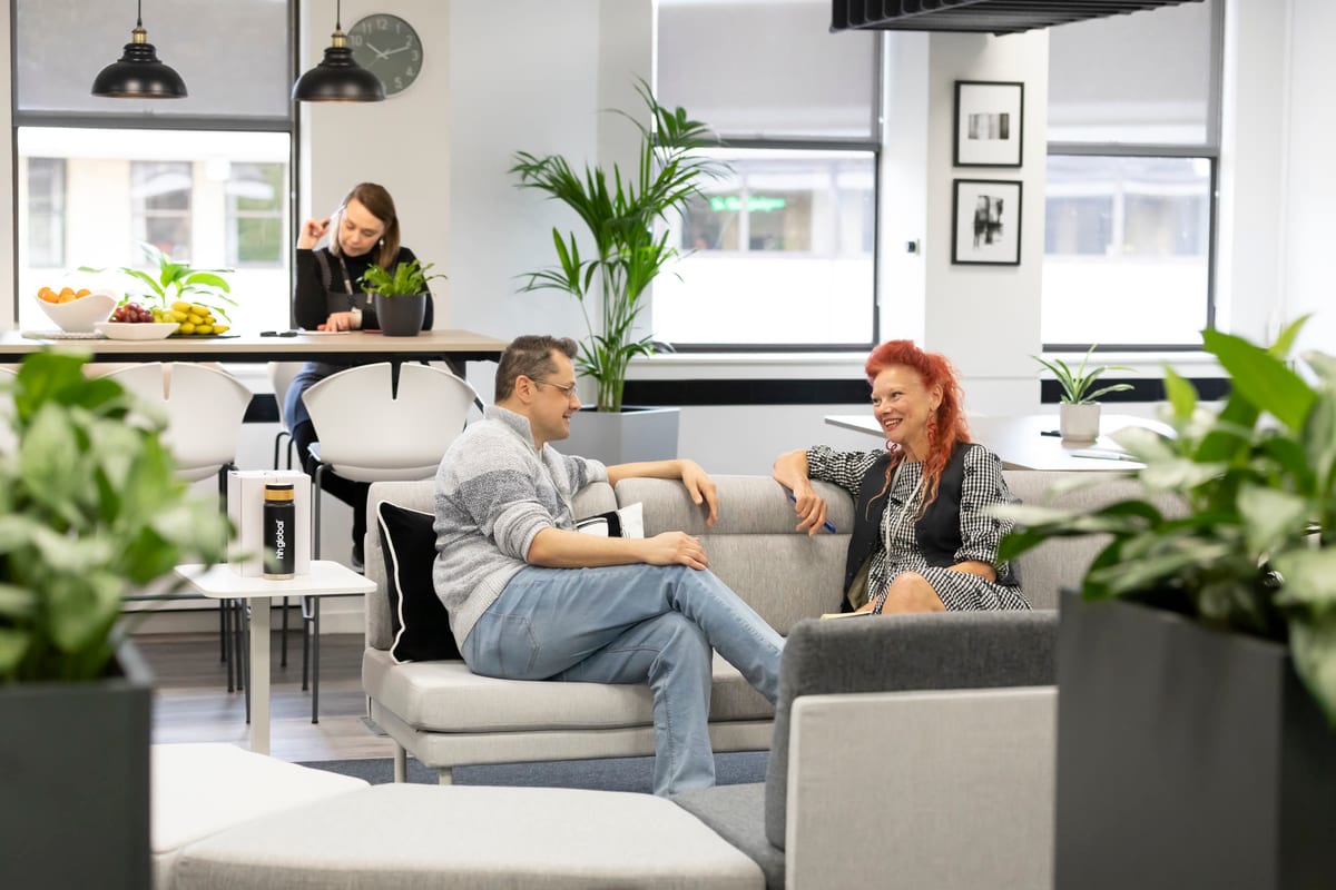 A member team working together in a serviced office at Watermoor Point