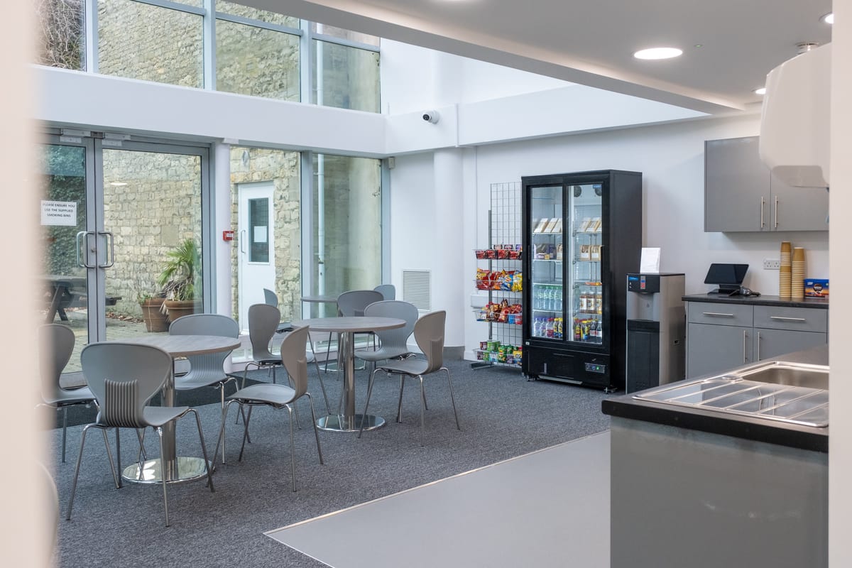 The kitchen and cafe area at Trinity Road, beside the glazed atrium